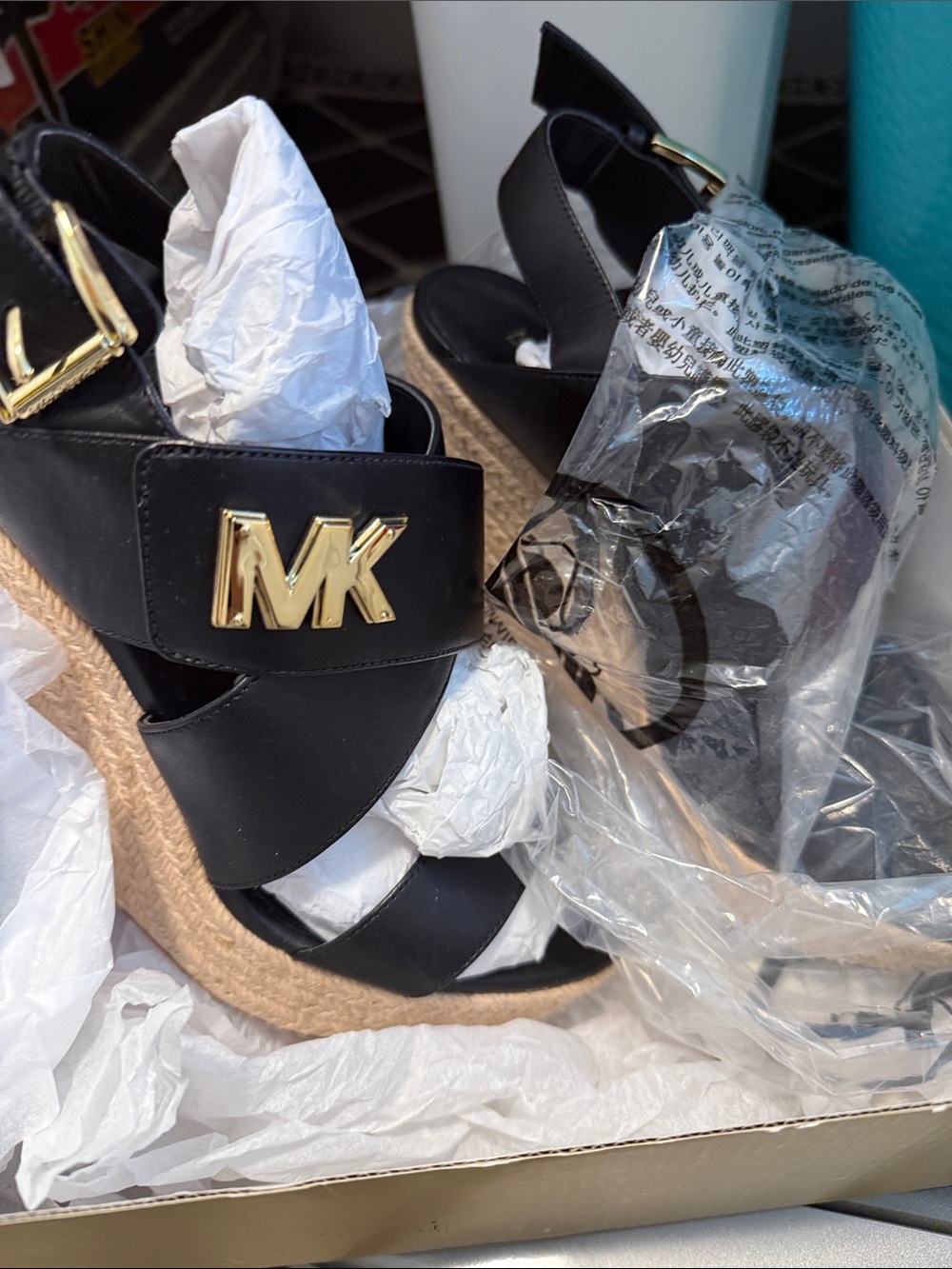 Michael Kors Black Wedge Sandals with Gold MK Logo